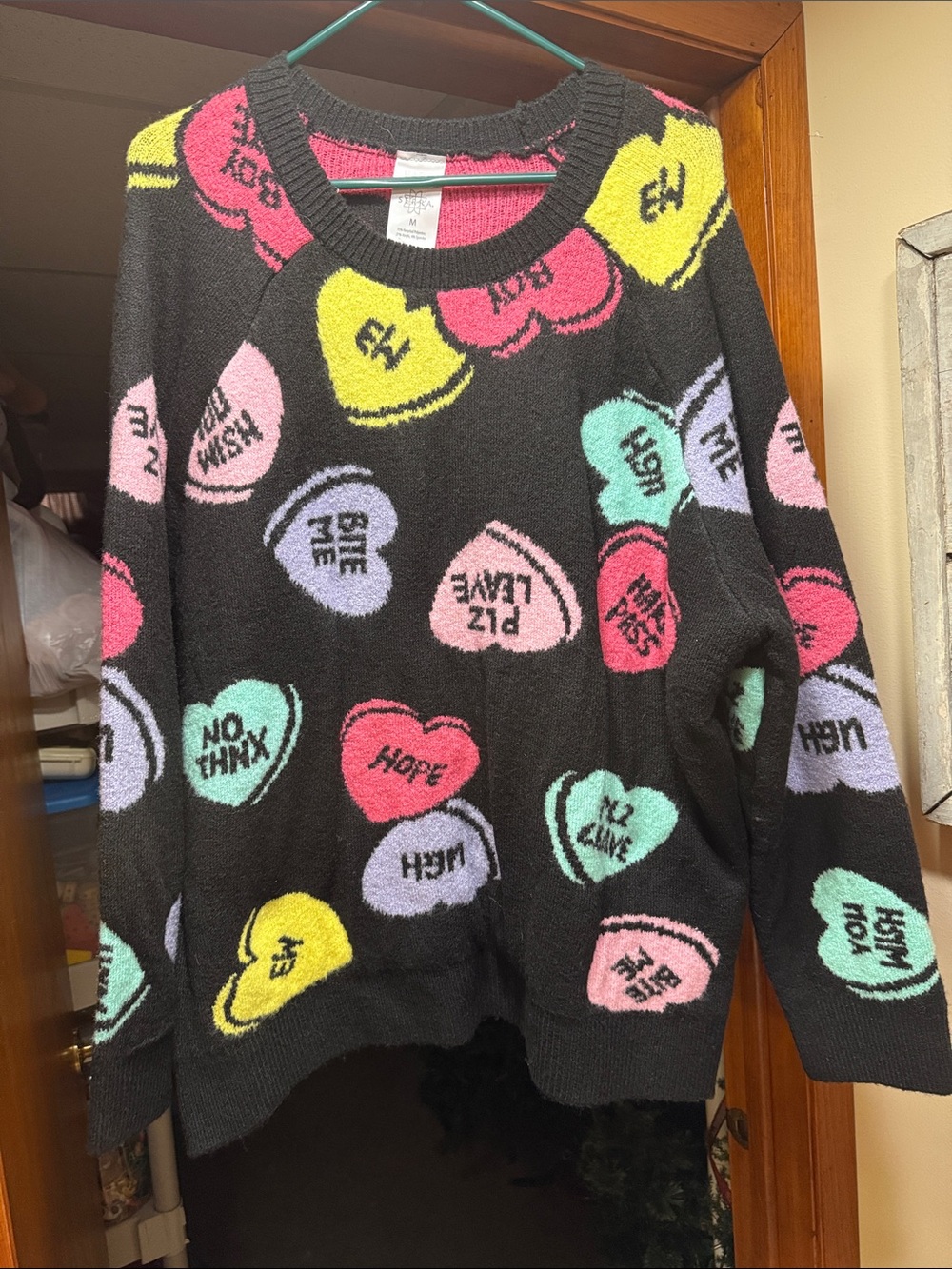Black Cozy Heart-Print Sweater with Pastel Conversation Hearts